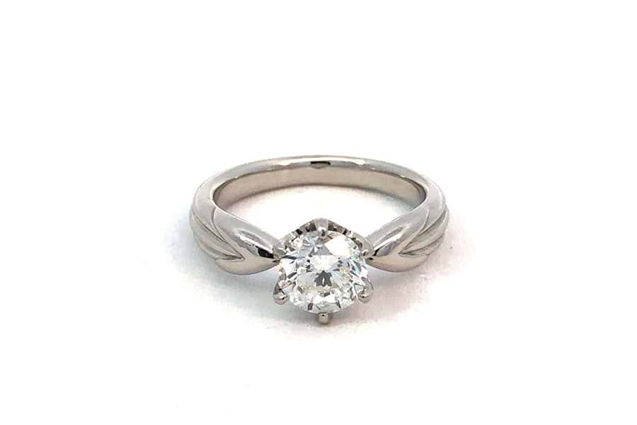 リング K18 約7.5号 赤色石0.62ct ダイヤ0.37ct の買取実績