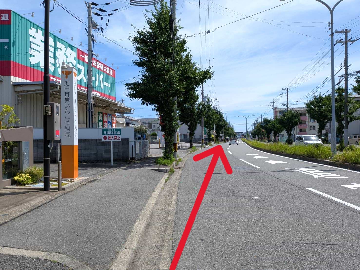 業務スーパー和歌川店を直進します