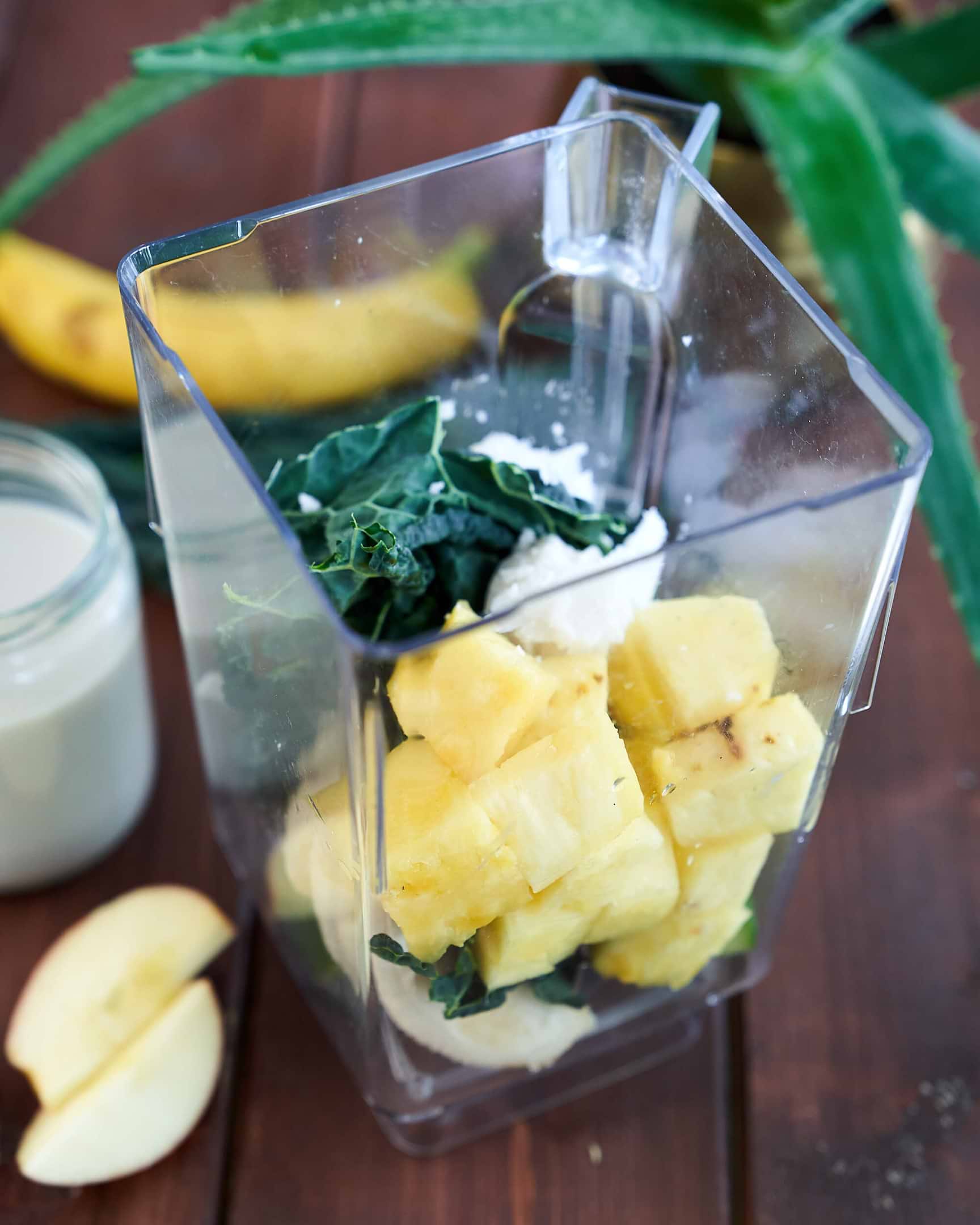Green Aloe Smoothie with Kale, Pineapple and Banana in Blender