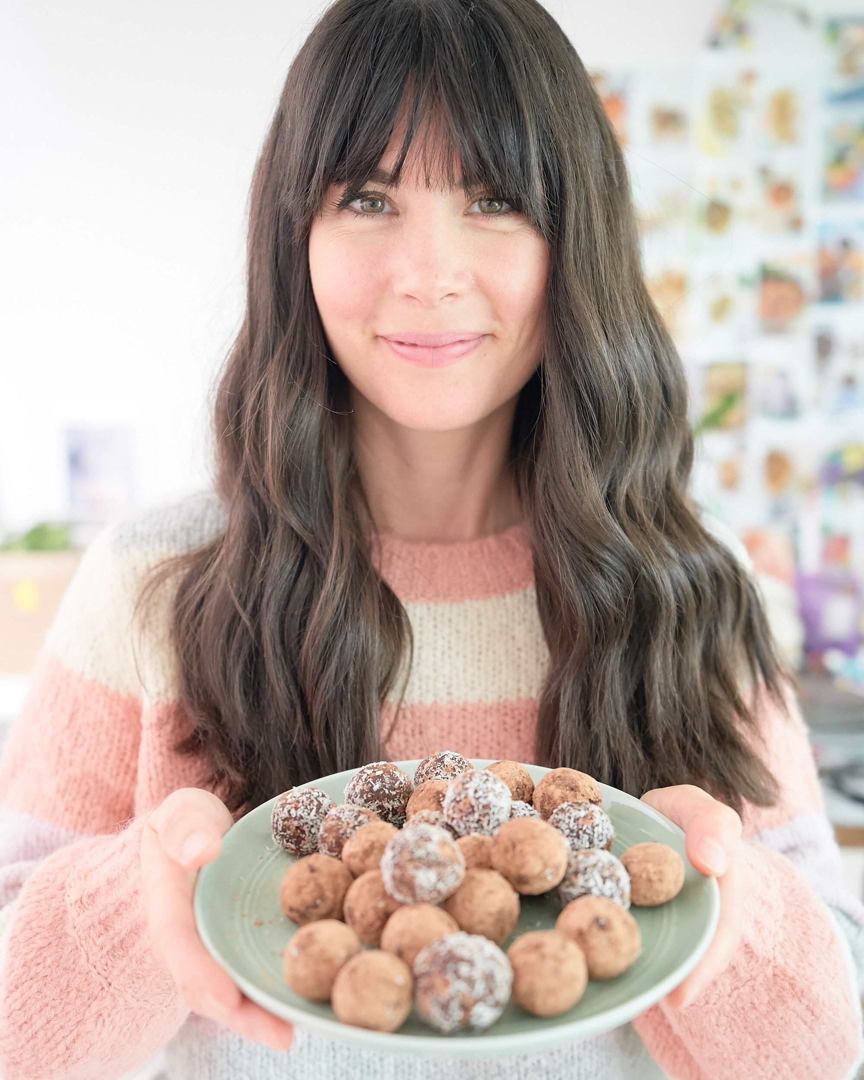 Joy with plate of no-bake chocolate truffles
