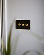 Soho Lighting Matt Black & Brushed Brass 20A 3 Gang Intermediate Toggle Screwless