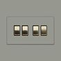 Soho Lighting Primed Paintable 4 Gang Intermediate switch with Brushed Brass Switch with Black Insert