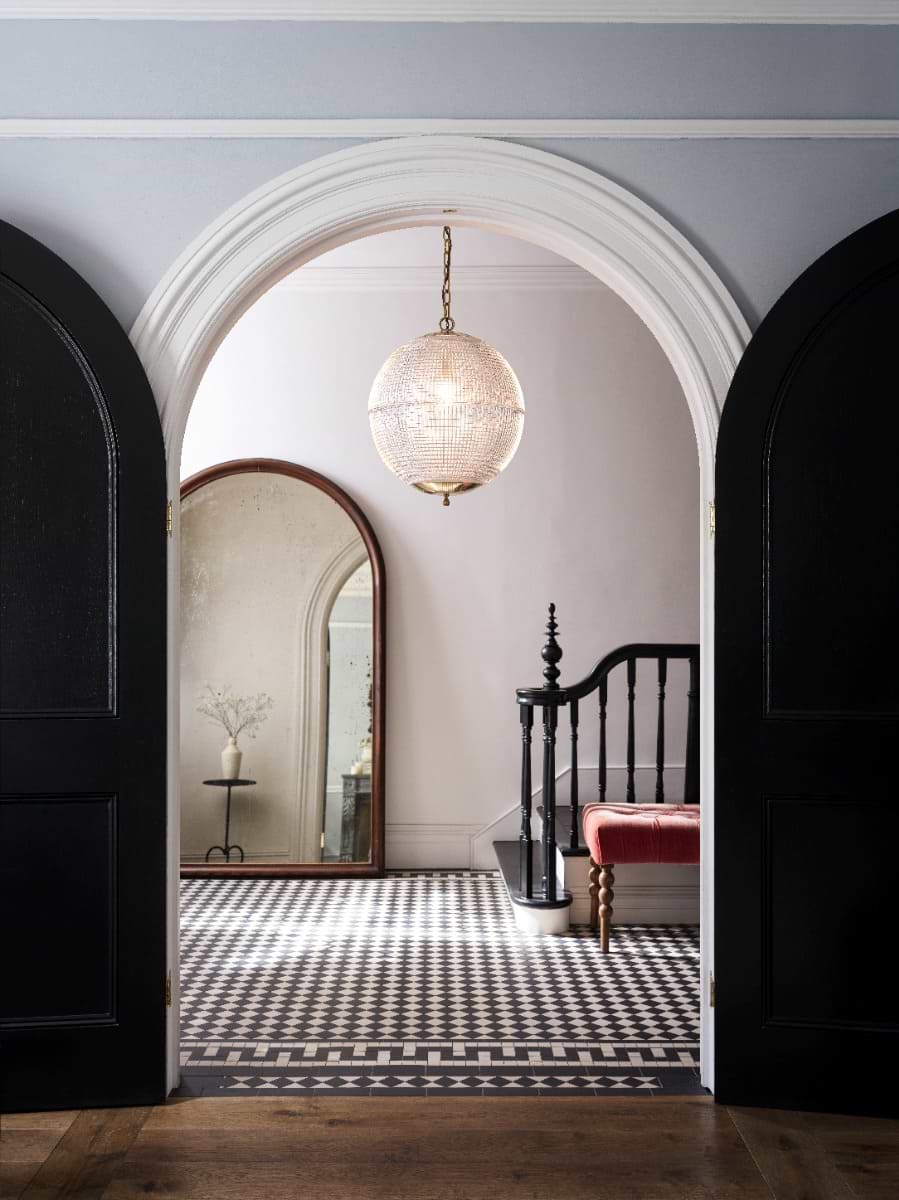 Glass pendant lighting fixtures with brass details