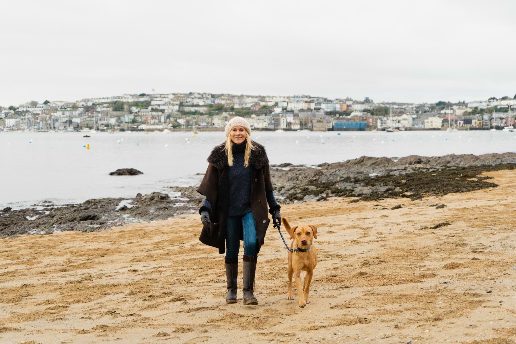 Lee Lovett walking along the Cornish coastline