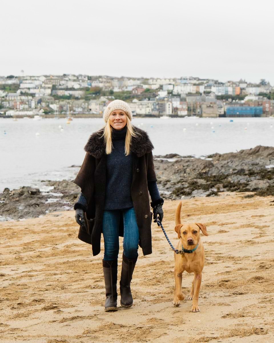 Lee Lovett walking along the Cornish coastline