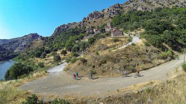 mountain biking past tiny villages