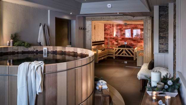 relax in the shared spa after a day on the slopes