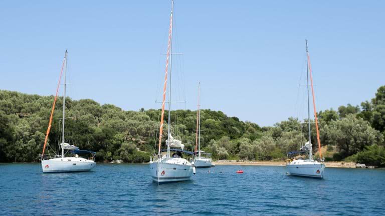 Yachts moored in a bay