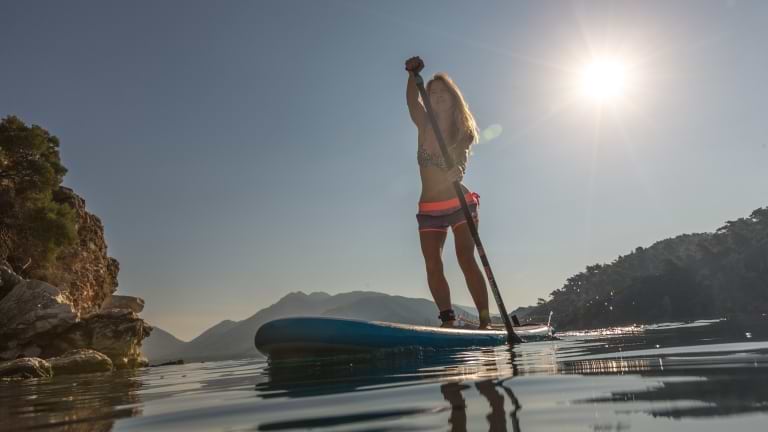 Paddle boarding at Neilson | Cook's Club Adakoy