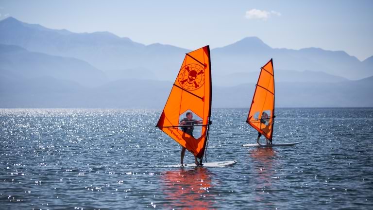 Beginner windsurfers at Buca Beach Club