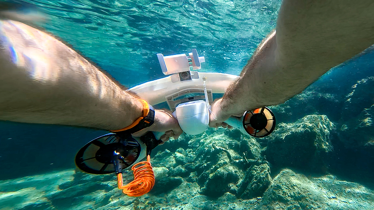 Underwater adventures with sea scooters at Neilson | Cook's Club Adakoy