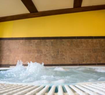 A large hot tub in the wellness area