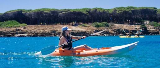 girl kayaking in Sardinia
