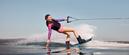 Woman wakeboarding in Greece