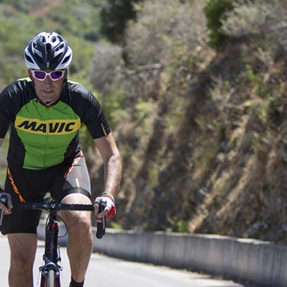 Man and woman road cycling
