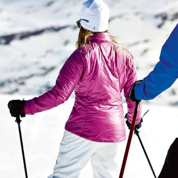 A couple learning to ski