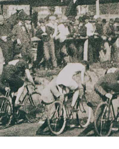 old black and white photograph of cyclists