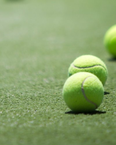 tennis balls on a tennis court