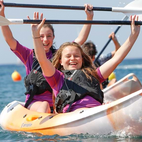Two teenagers on a kayak