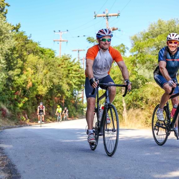 Two men road cycling on holiday