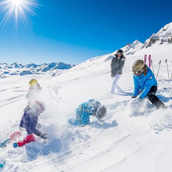 Family playing in snow