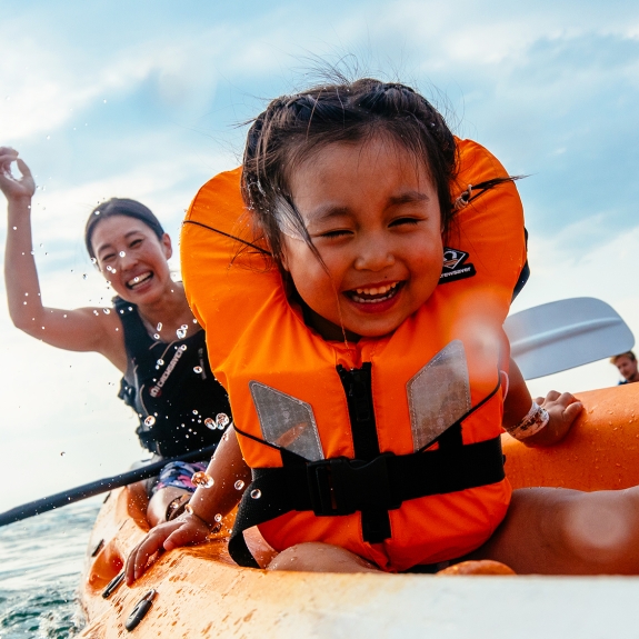 Mum and child on kayak