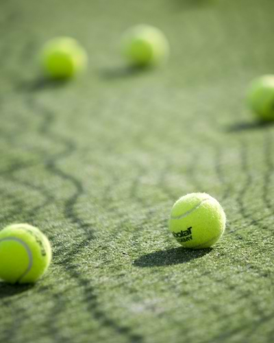 tennis balls on a tennis court