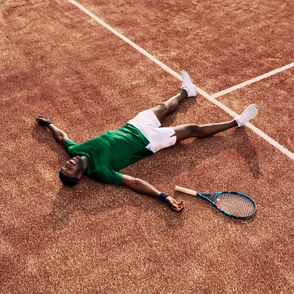Man on tennis court