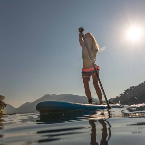 Paddle boarding at Neilson | Cook's Club Adakoy