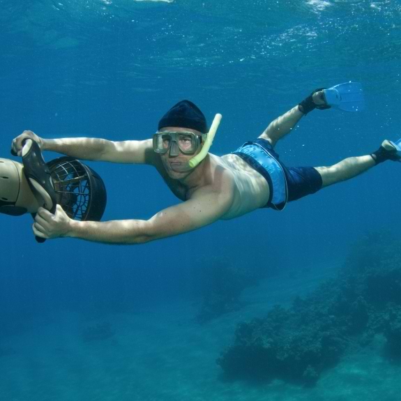 Explore vibrant marine life with sea scooters at Neilson | Cook's Club Adakoy