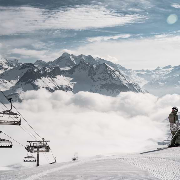skier at top of lifts
