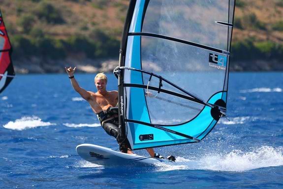 Man windsurfing in Greece