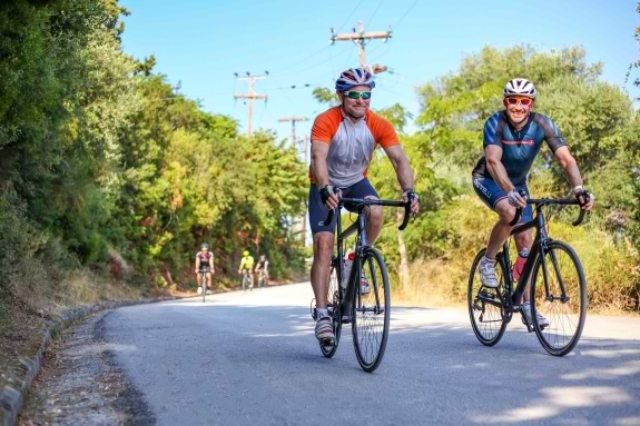 Two men road cycling on holiday