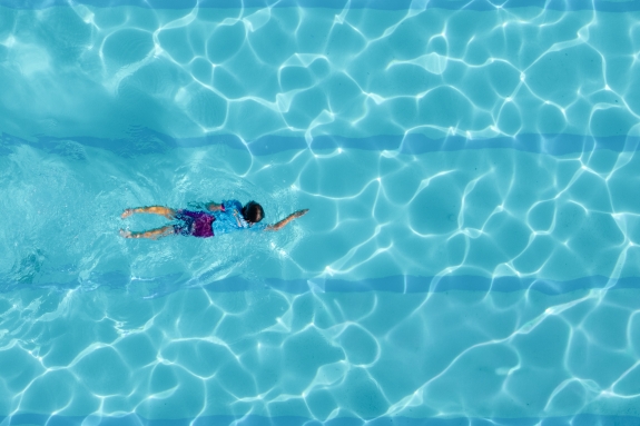 Girl swimming front crawl