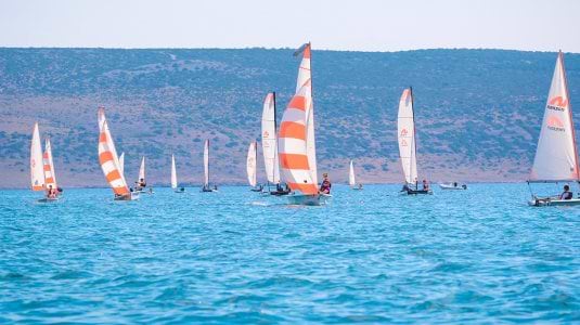 group of people dinghy sailing in Croatia