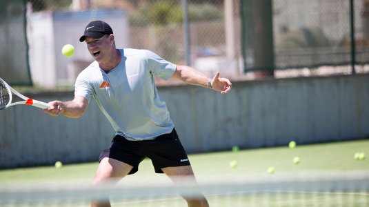 Mark Petchey playing tennis at Neilson Messini Beacchclub in Greece