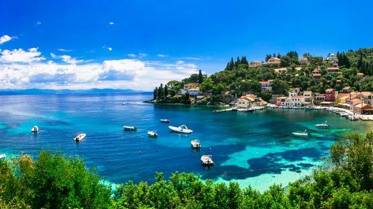 a cove with blue sea on the island of Paxos 