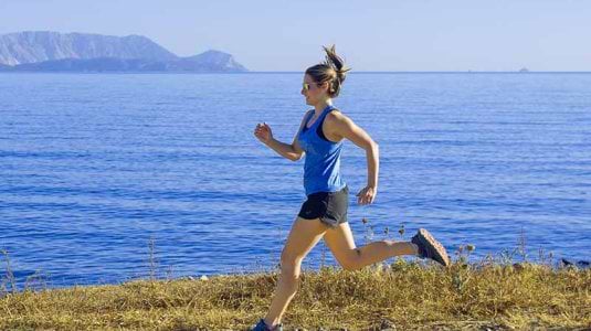 running on beachfront in Sardinia