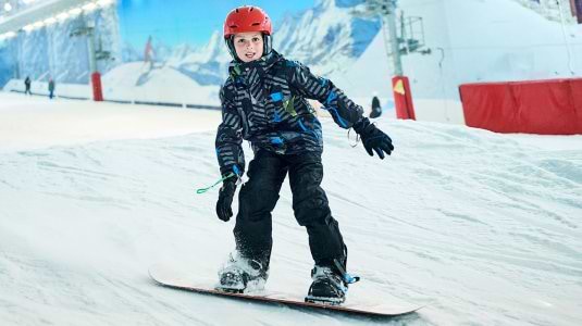 teenager snowboarding