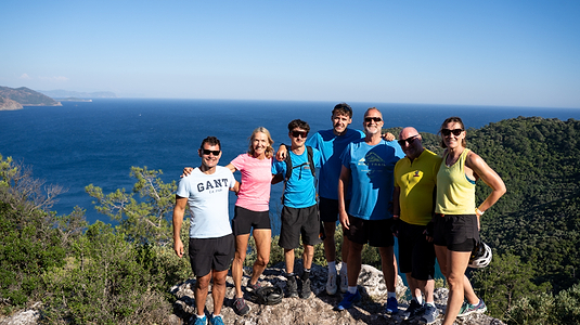 Group smiling with a view