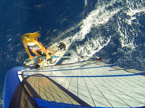 Woman windsurfing in Greece