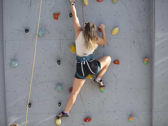 woman on climbing wall