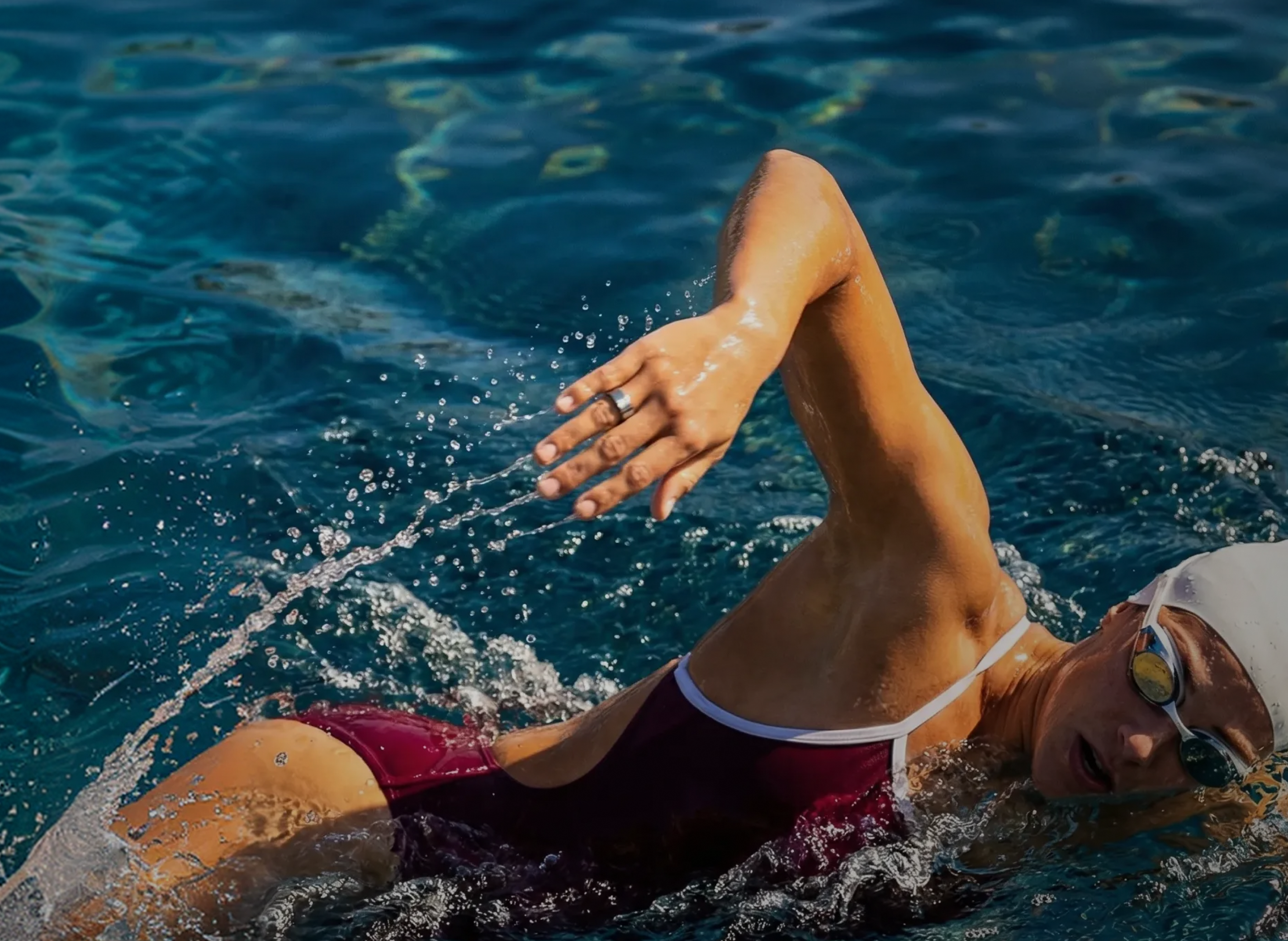 A swimmer wearing Ring PRO mid-stroke