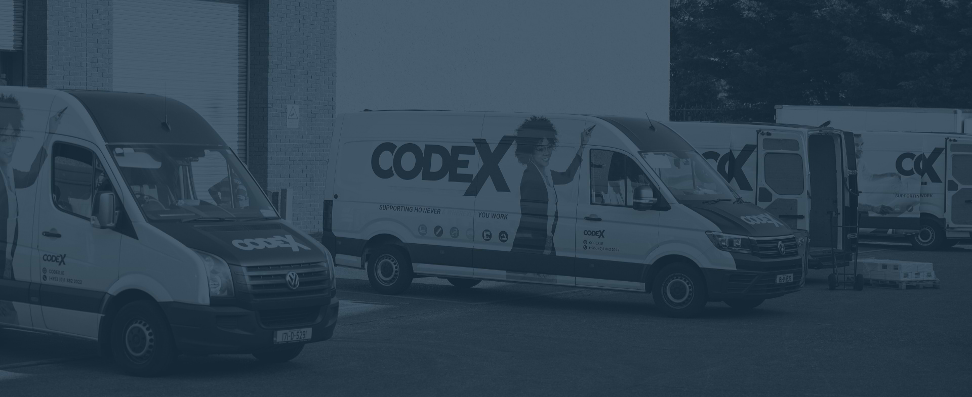 codex-delivery-van-outside-office-building