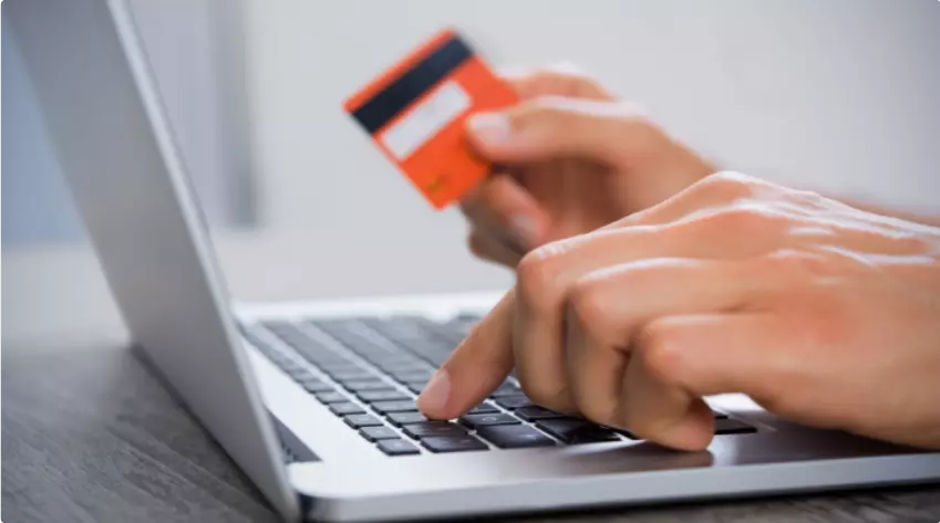 person-with-credit-card-placing-online-order