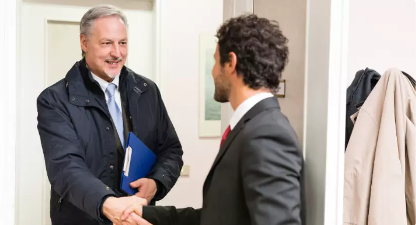 two-businessmen-shaking-hands