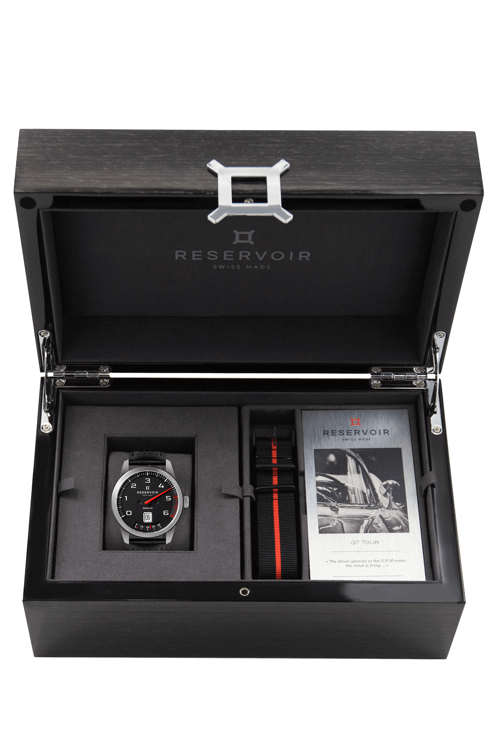 Media editorial of a luxury RESERVOIR watch featuring dark charcoal, light grey, and medium grey colors.