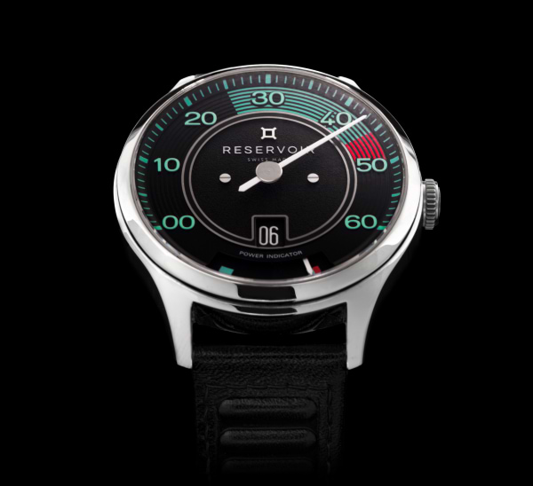 Media of a RESERVOIR Watch in a luxury editorial featuring jet black, light grey, and light teal colors.