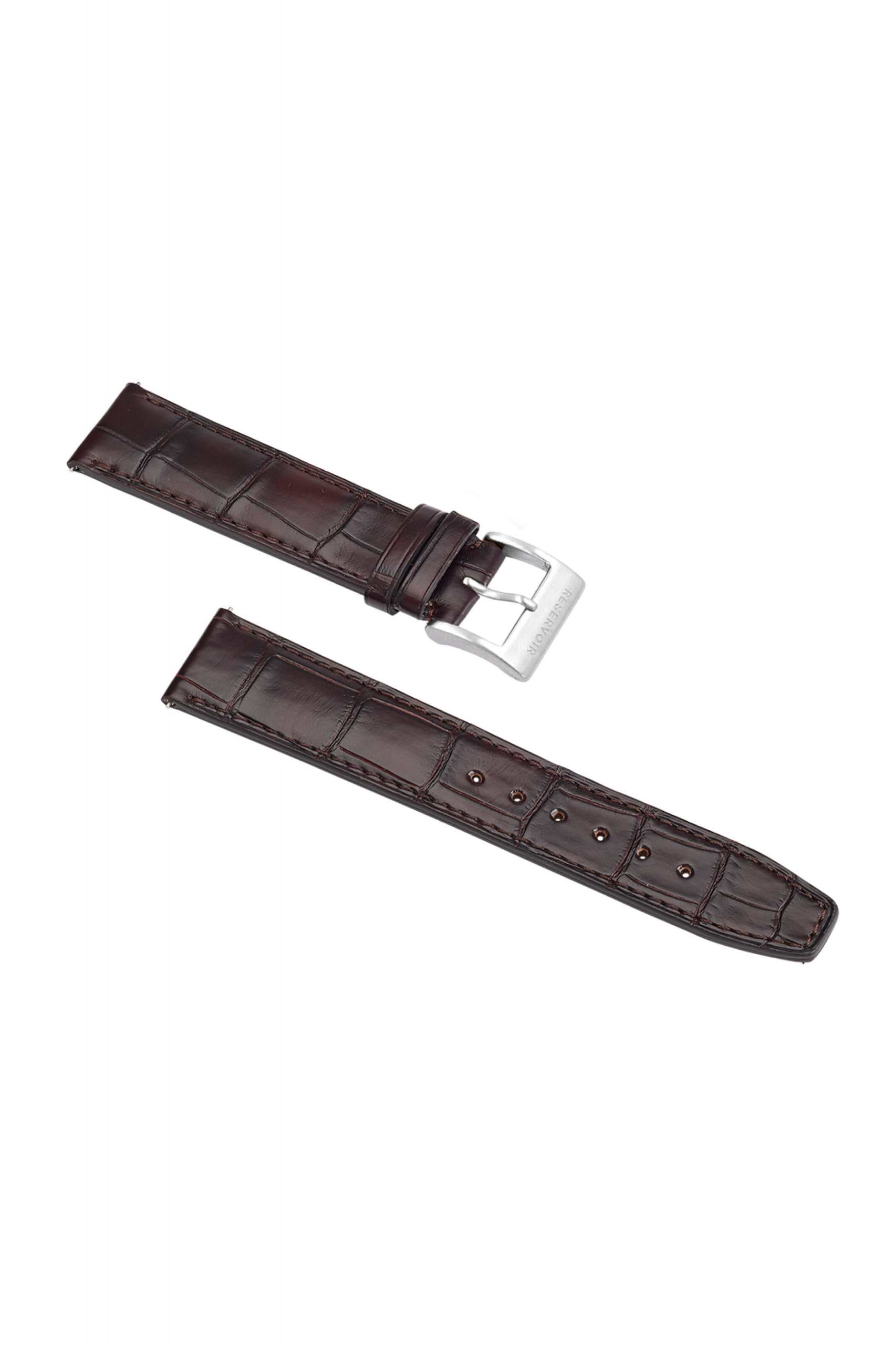 Brown leather watch strap in two pieces with crocodile texture and silver buckle, adjustable holes.