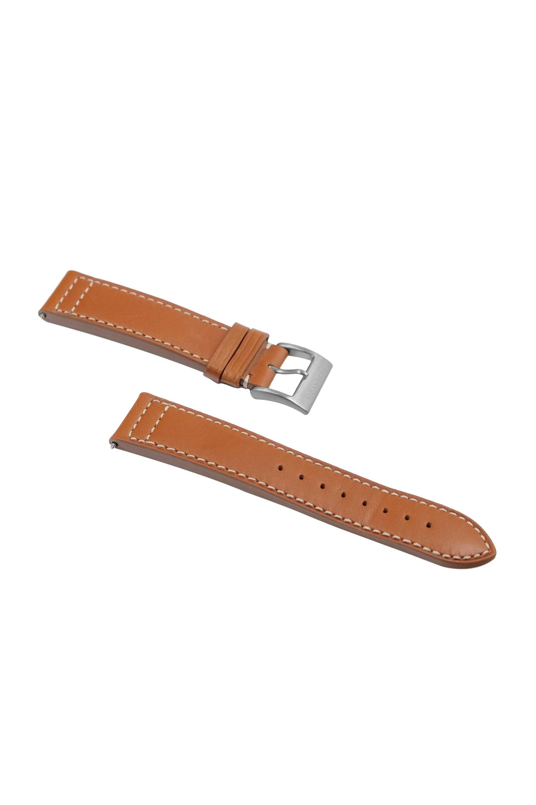 Leather strap WW1 biplane watch with light brown, pink, and grey colors.